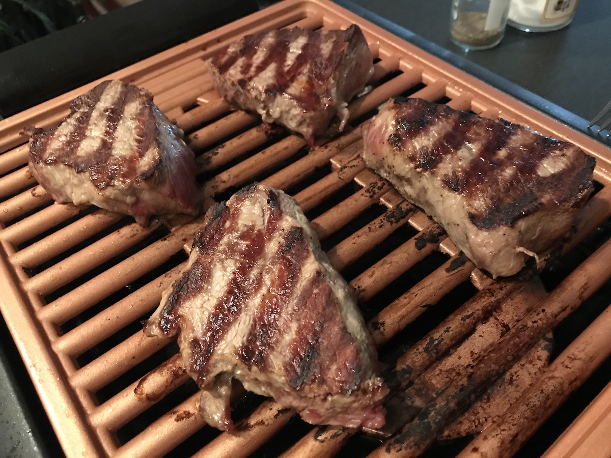 Steaks on electric grill.