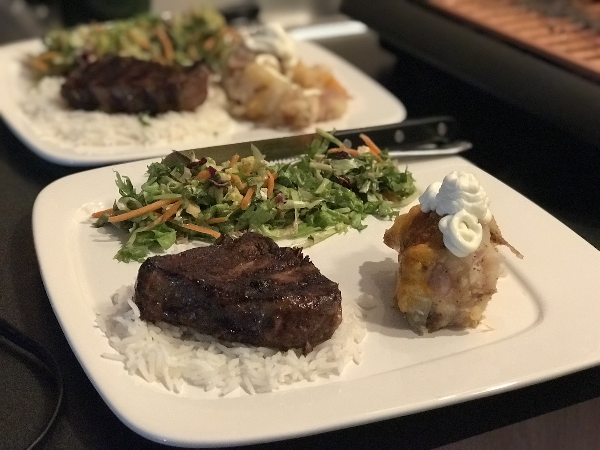 Steak, Rice, Potatoes & Salad